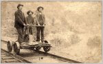 three-men-atop-a-handcar-on-rail-track-through-a-river-valley-murchie-archibald-1899-celestial...jpg